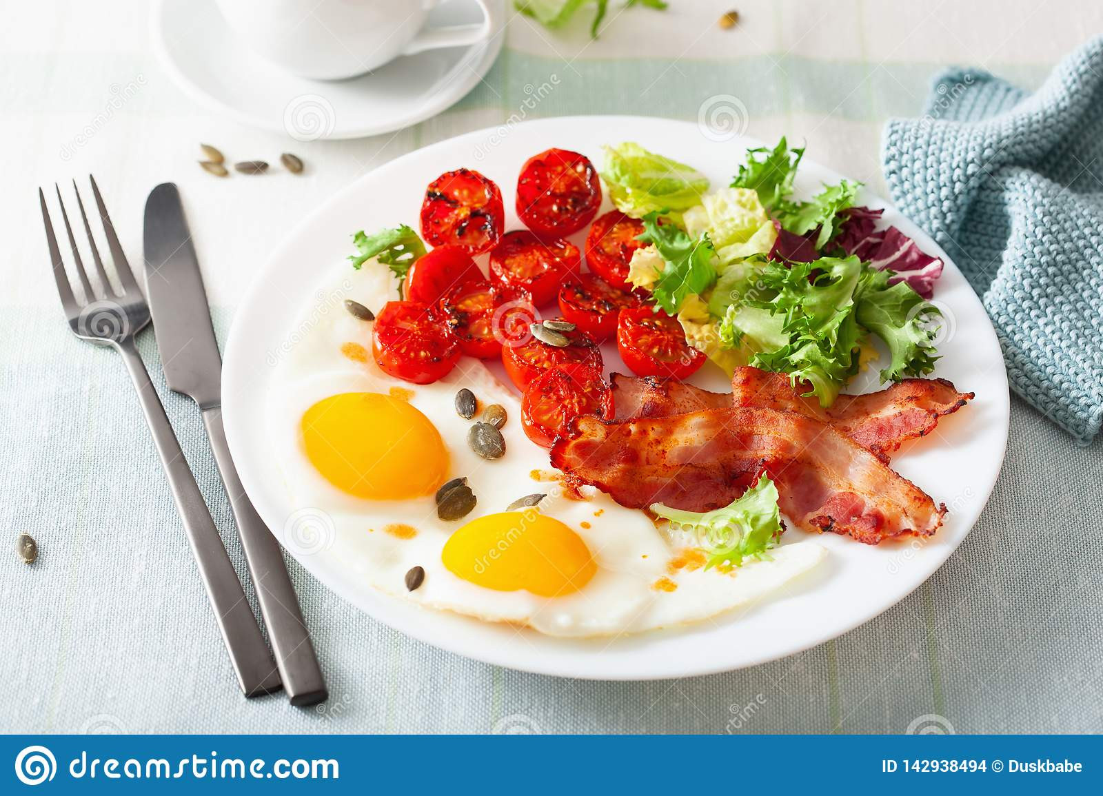 Bacon Keto Diet
 Healthy Keto Diet Breakfast Egg Tomatoes Salad Leaves