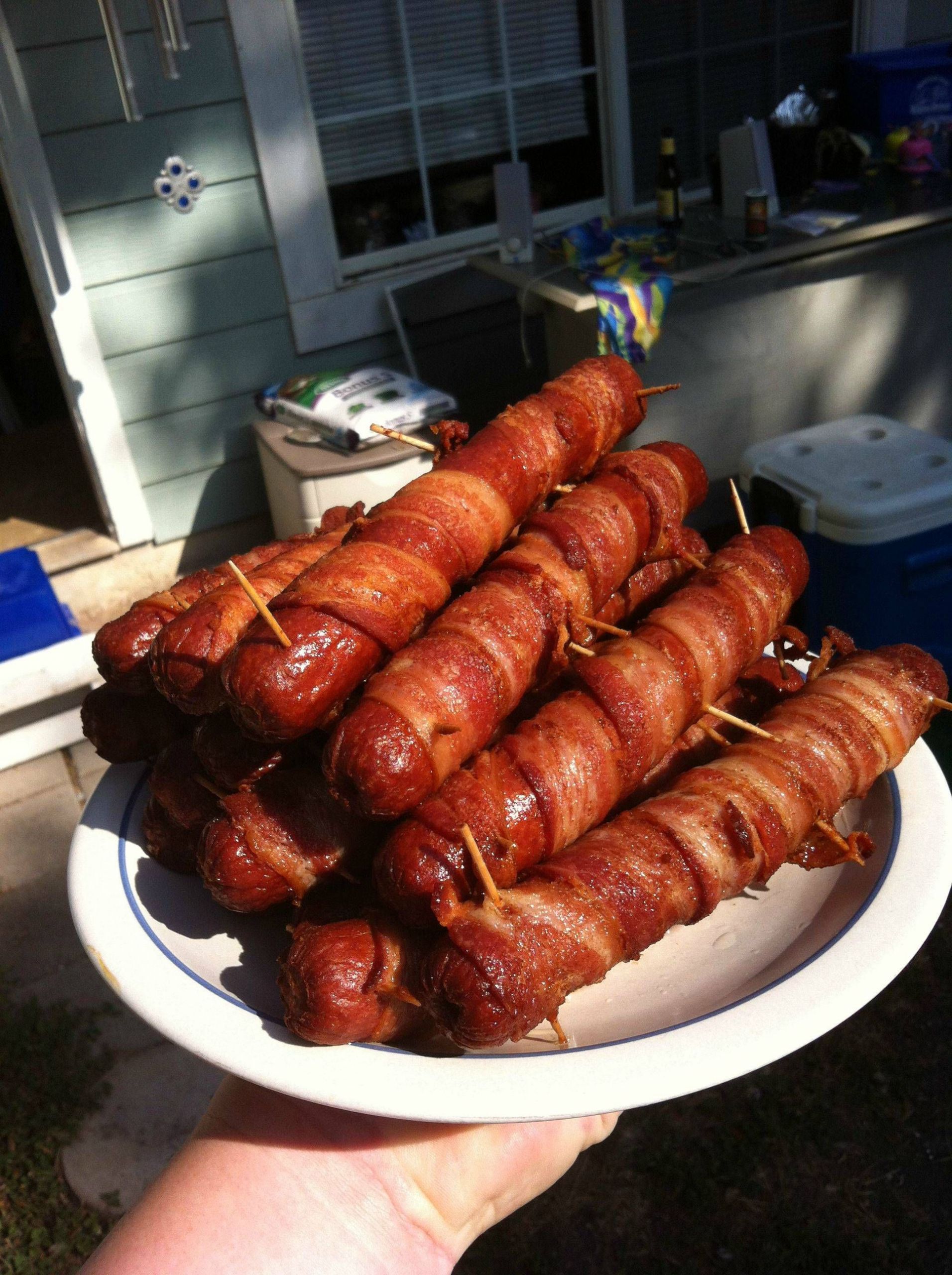 Deep Fried Bacon Wrapped Hot Dogs
 1 4 lb Nathans wrapped in bacon and deep fried