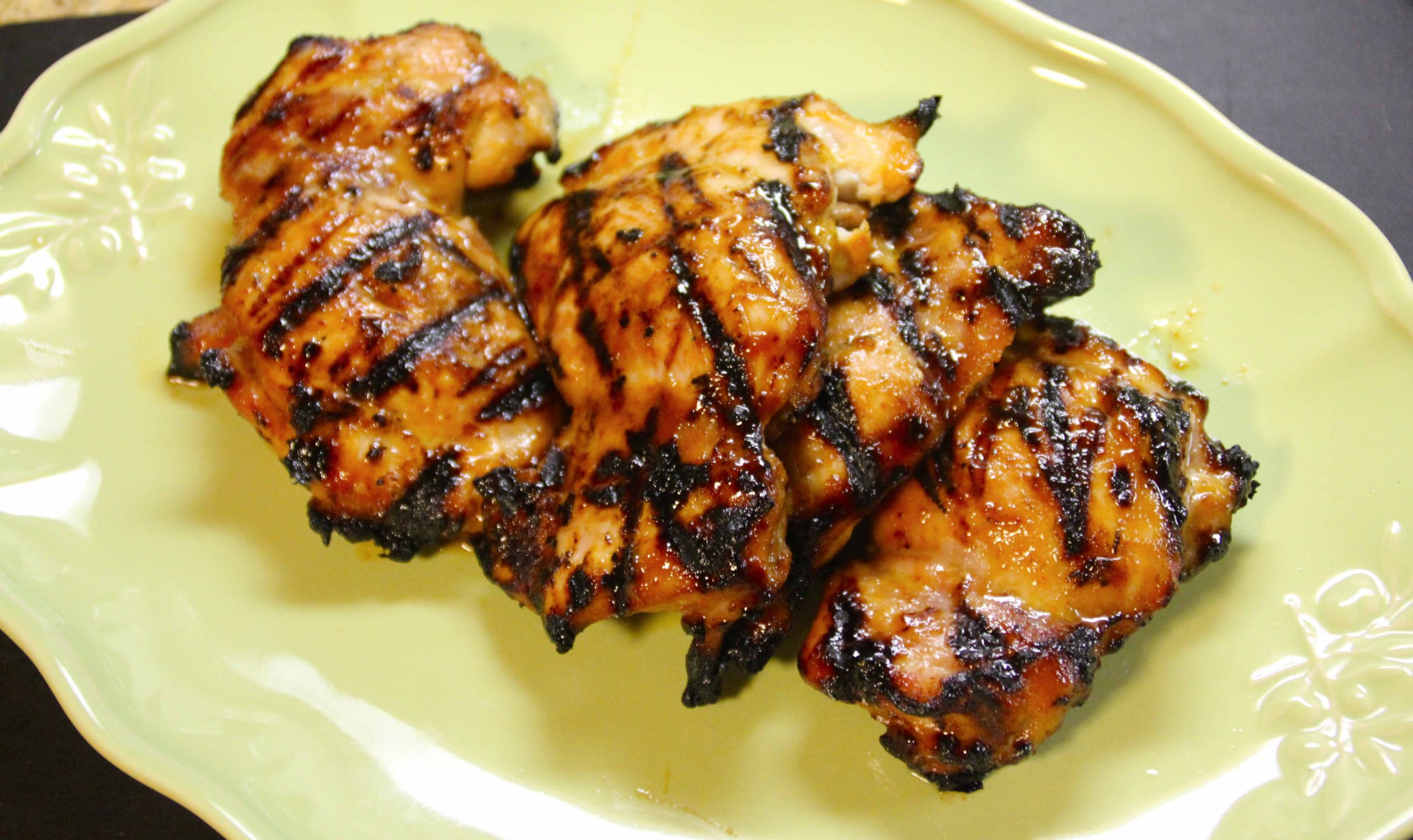 Grilled Chicken Thighs
 sweet & spicy citrus sriracha grilled chicken thighs