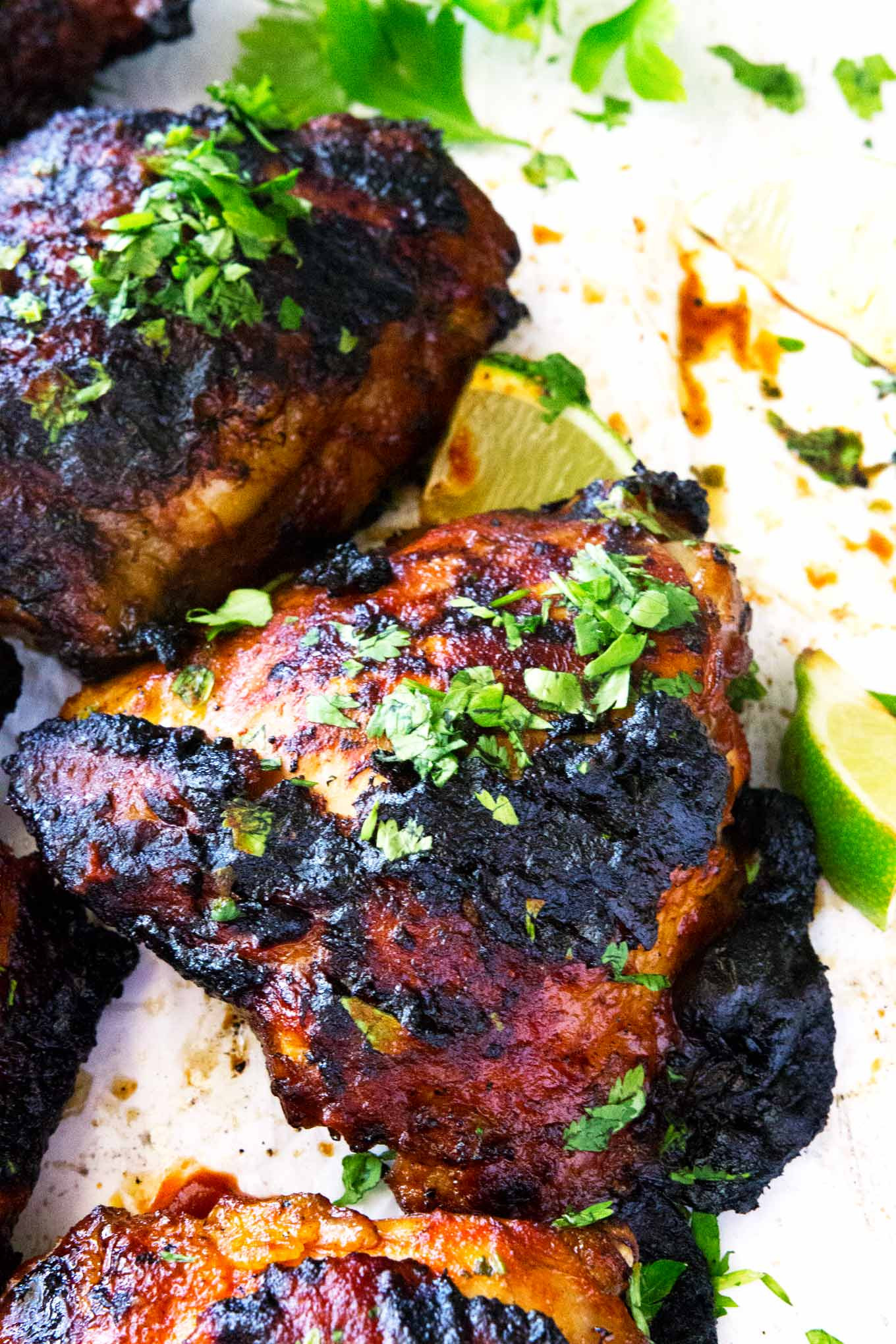 Grilled Chicken Thighs
 Sriracha Grilled Chicken Thighs with Honey and Lime • So