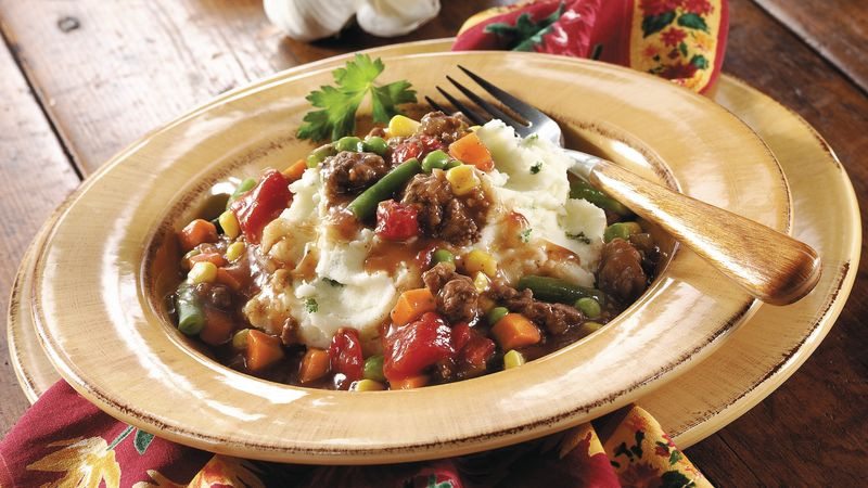 Ground Beef Potatoes
 Ground Beef Stew over Garlic Mashed Potatoes recipe from