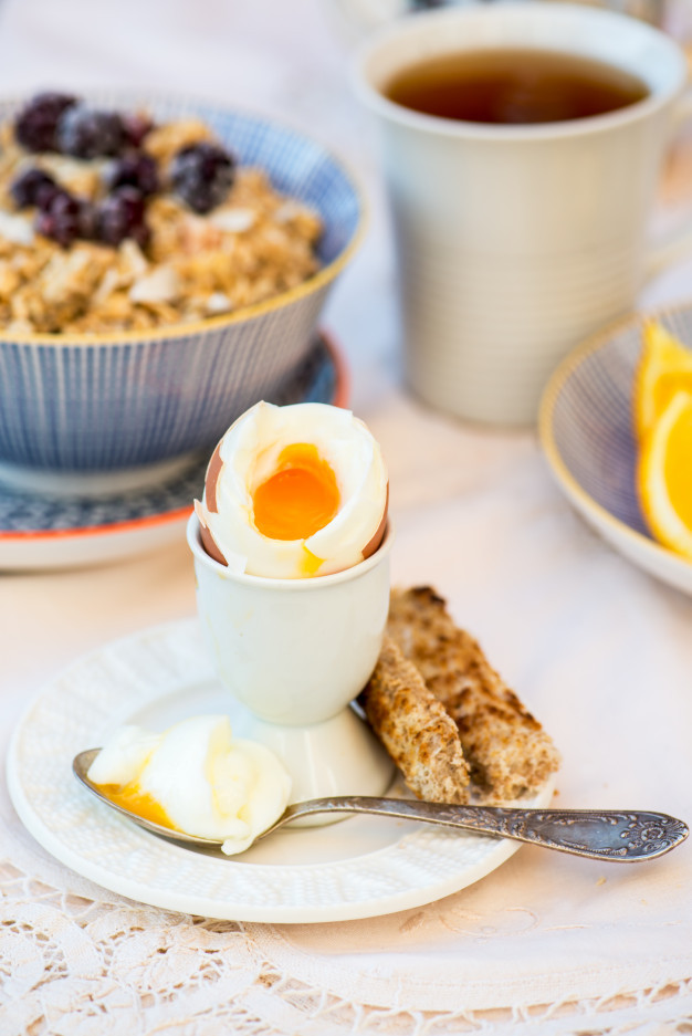 Healthy Breakfast With Boiled Eggs
 Healthy breakfast with boiled egg and granola