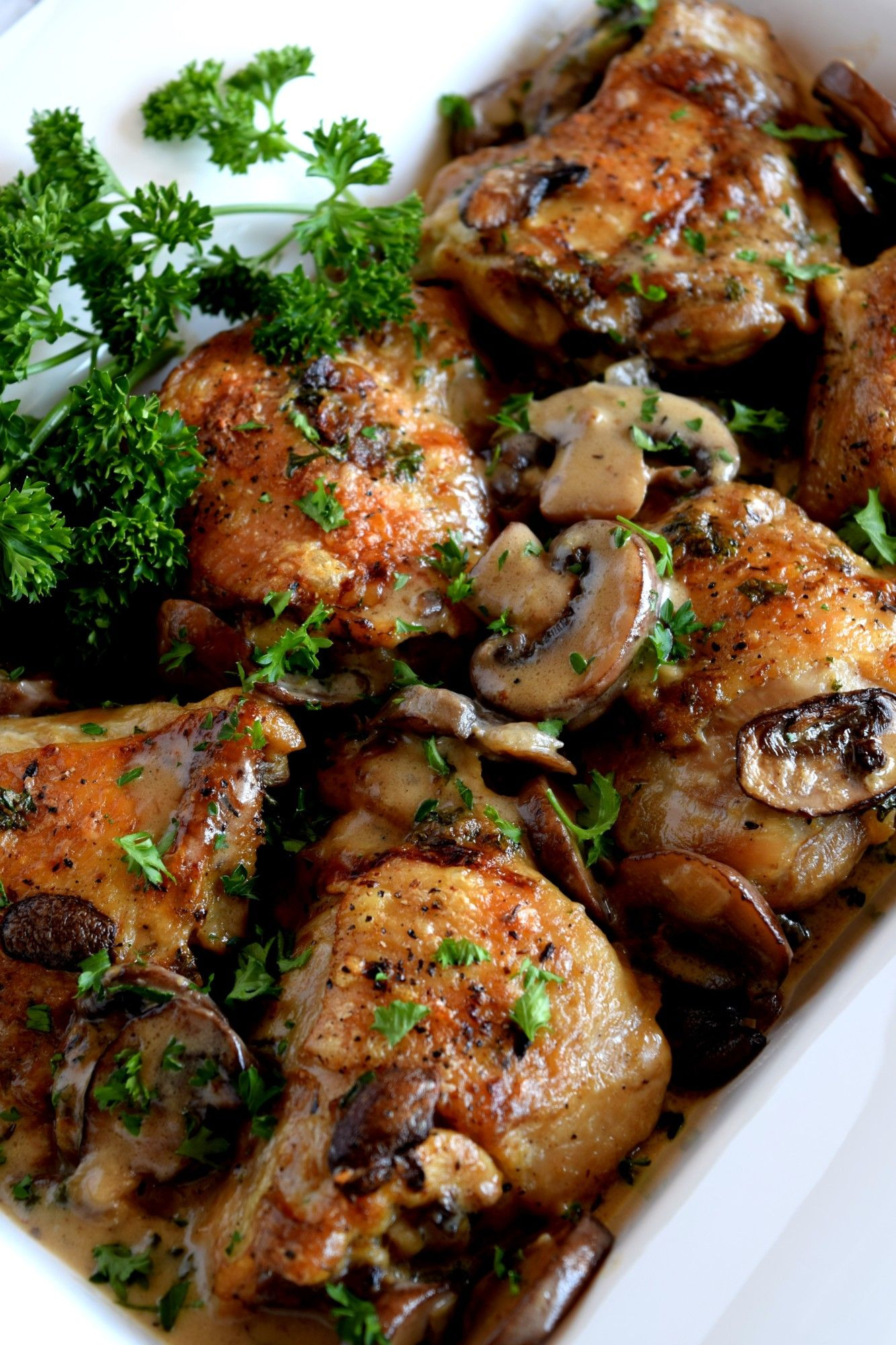 Pan Seared Chicken Thighs
 Pan seared chicken thighs nestled in a thick creamy