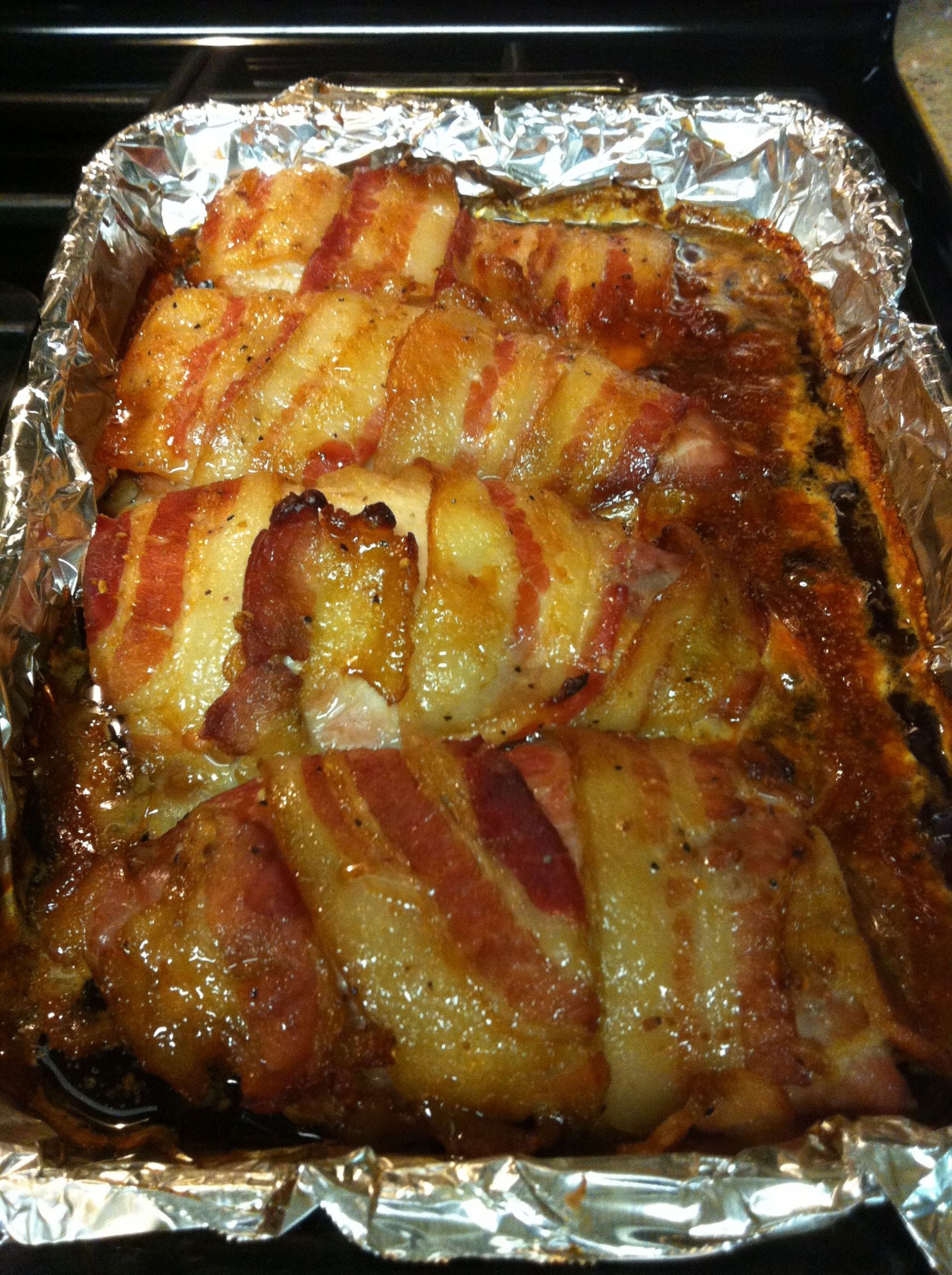 Pork Tenderloin Dinner Ideas
 Bacon wrapped pork tenderloin Recipe on dinner board