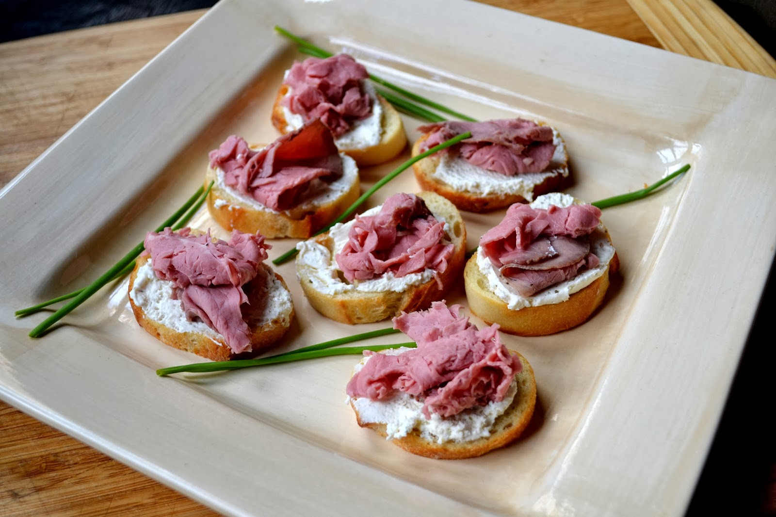 Roast Beef Appetizers
 Hardly Housewives Roast Beef and Garlic Herb Cheese Crostini
