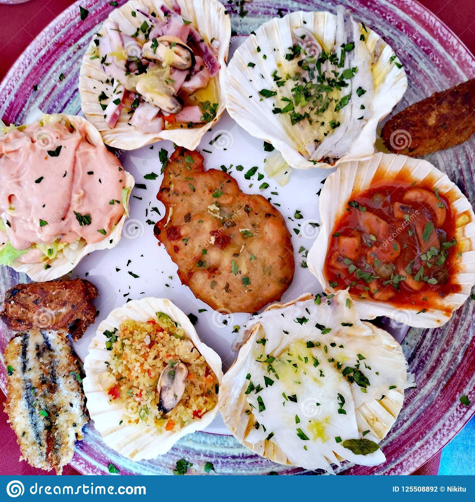 Seafood Appetizers Italian
 Seafood Appetizers Scallop Shells Stock Image